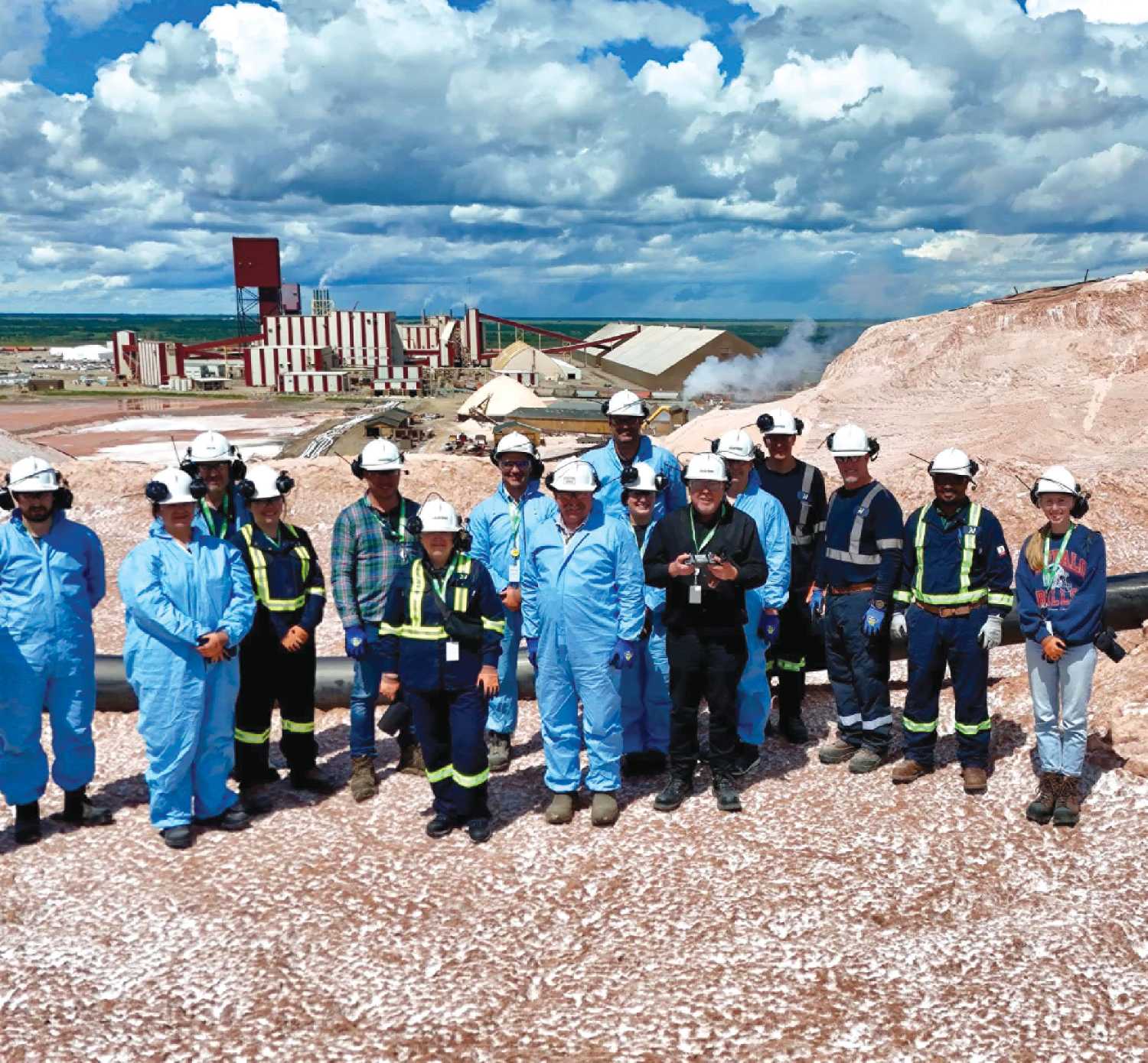 Saskatchewan Government officials and Nutrien Rocanville supervisors on top of the salt pile at Nutrien Rocanville on Thursday, June 18. 